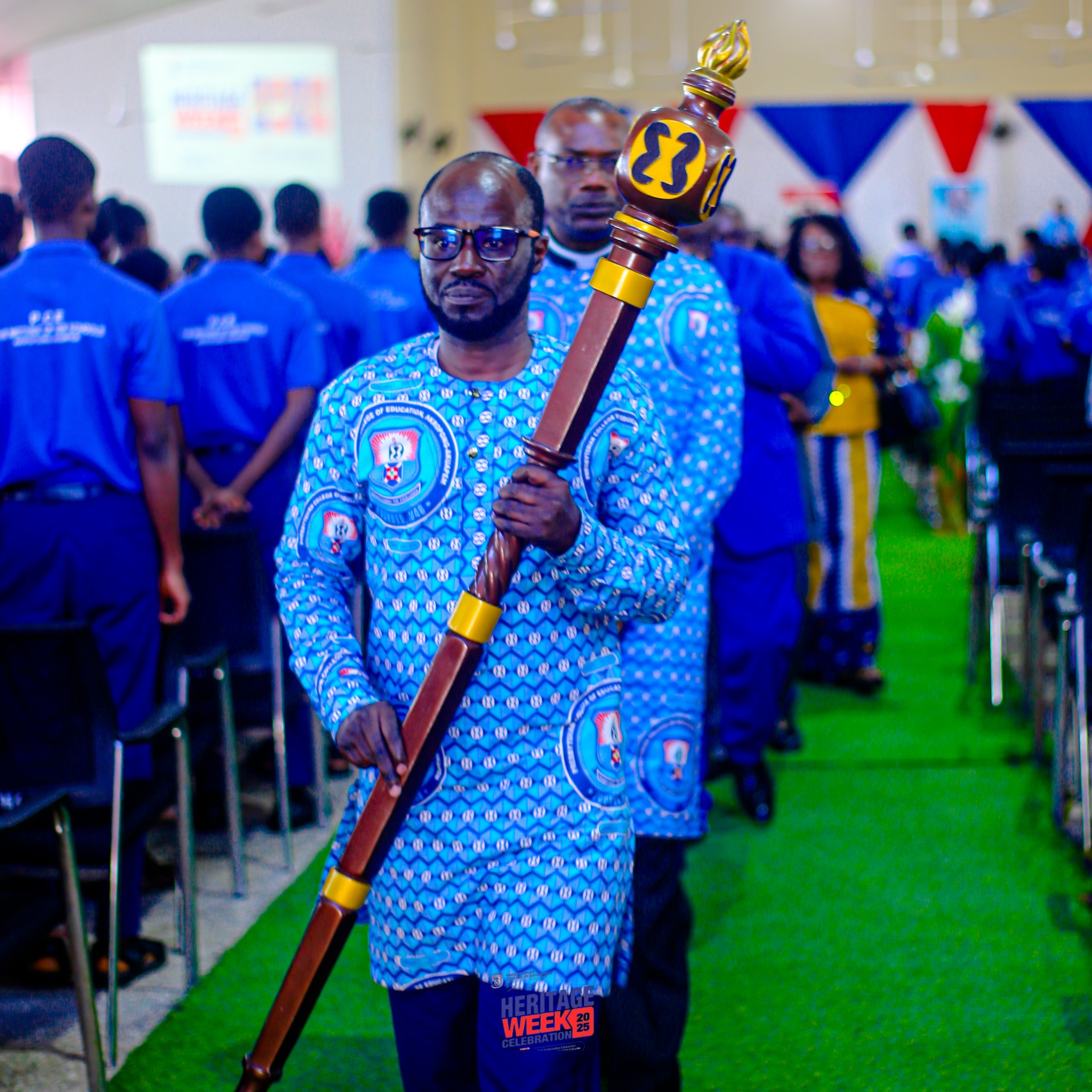 Heritage Week procession with the ceremonial staff